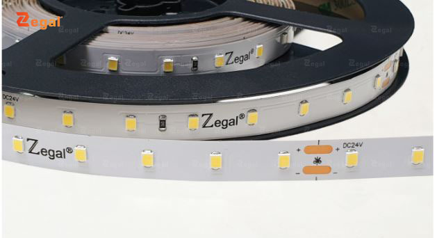LED strips create a soft, diffused ceiling effect, making the living room space look luxurious and modern.