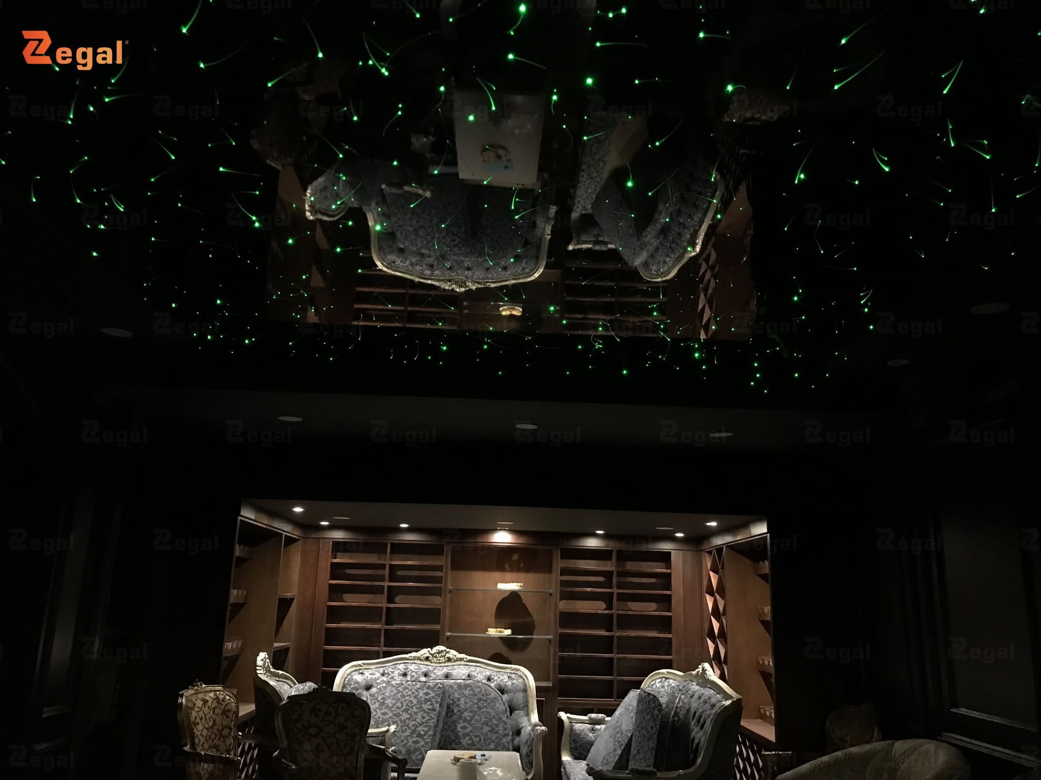 A Fiber-Optic Star Ceiling creates a starry sky effect through the combination of optical fibers, a light source, a control system, and a backing panel.