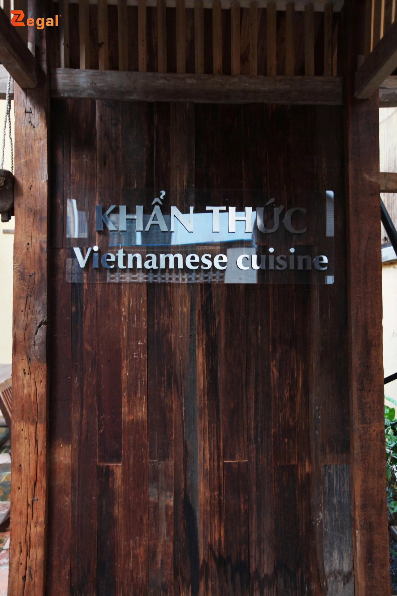 The Khan Thuc Vietnamese Cuisine space combines wood elements with warm lighting.